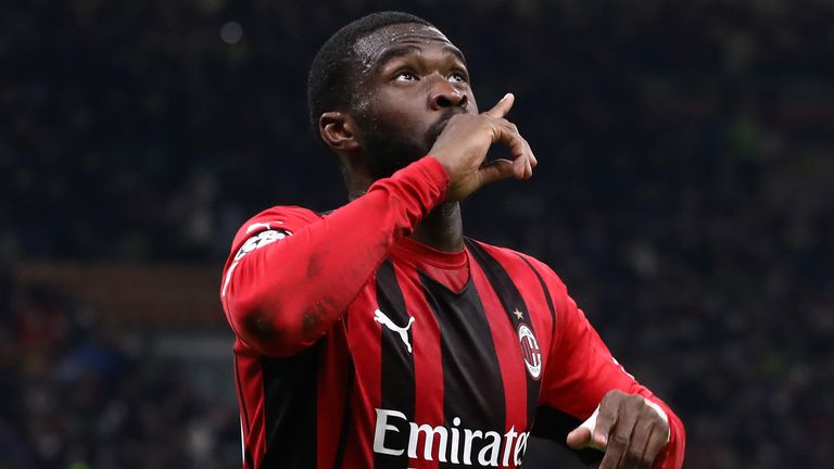 Fikayo Tomori celebrates after giving AC Milan the lead against Liverpool at the San Siro