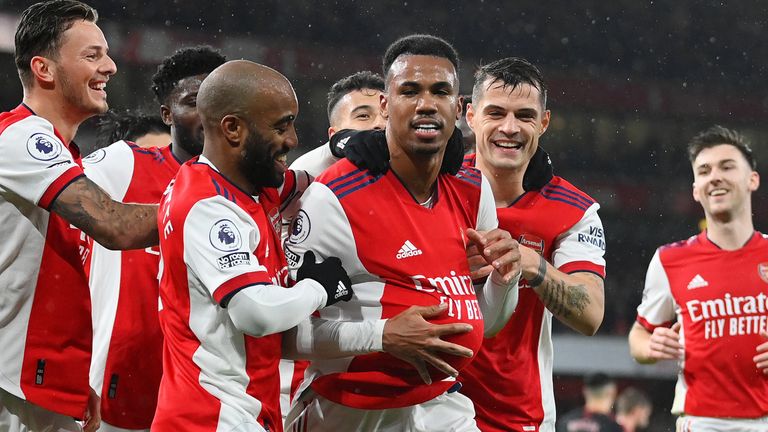 Arsenal&#39;s Gabriel celebrates with teammates after making it 3-0