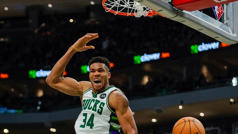 Milwaukee Bucks&#39; Giannis Antetokounmpo dunks during the second half of an NBA basketball game against the Charlotte Hornets Wednesday, Dec. 1, 2021, in Milwaukee. The Bucks won 127-125. (AP Photo/Morry Gash)



