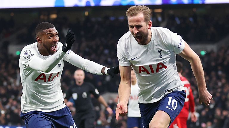 Harry Kane celebrates scoring a goal between Tottenham and Liverpool