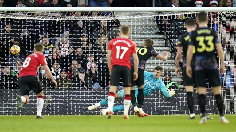 Harry Kane steers his penalty beyond Fraser Forster