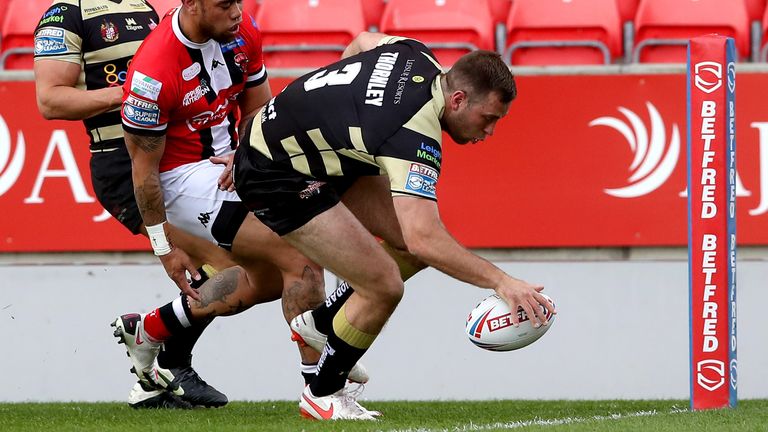 Salford Red Devils v Leigh Centurions - Betfred Super League - AJ Bell Stadium
Leigh Centurions' Iain Thornley (right) scores his side's second try of the game during the Betfred Super League match at the AJ Bell Stadium, Salford. Picture date: Friday April 23, 2021.