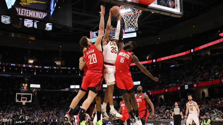 Isaac Okoro #35 of the Cleveland Cavaliers dunks the ball during the game against the Houston Rockets on December 15, 2021 at Rocket Mortgage FieldHouse in Cleveland, Ohio.