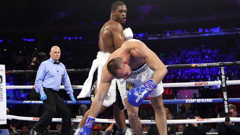 NEW YORK, NEW YORK - DECEMBER 11: Jared Anderson (R) knocks-down Oleksandr Teslenko (L) during their fight for the Jr. NABF heavyweight championship at Madison Square Garden on December 11, 2021 in New York City. (Photo by Mikey Williams/Top Rank Inc via Getty Images)