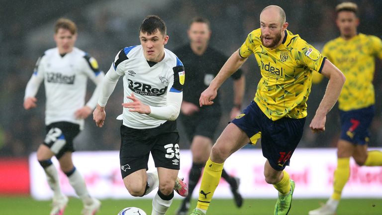 Derby County's Jason Knight and West Bromwich Albion's Matt Clarke in action