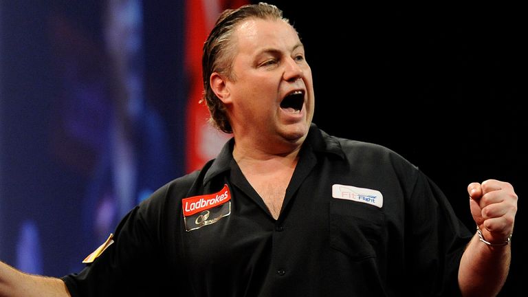 Canada's John Part celebrates his victory against England's Joe Cullen during the Ladbrokes.com World Darts Championship at Alexandra Palace, London.