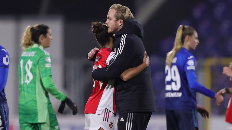 Jonas Eidevall embraces Nikita Parris after Arsenal's defeat in the Women's Champions League