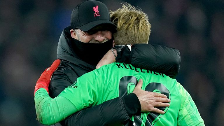 Liverpool manager Jurgen Klopp celebrates with Liverpool goalkeeper Caoimhin Kelleher at full time after the Carabao Cup quarter final match at Anfield, Liverpool. Picture date: Wednesday December 22, 2021.