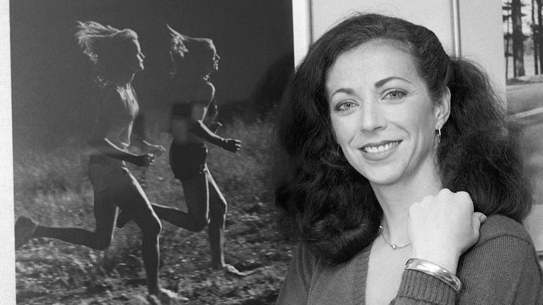 In this May 22, 1980 file photo, pioneer woman marathoner Kathrine Switzer stands in her New York office. In 1967, Switzer became the first woman to run with an official bib number in the Boston Marathon. A new film that captures much of the Boston Marathon's colorful history premieres Saturday, April 15, 2017, in conjunction with the 121st running of the race on Monday. (AP Photo/Suzanne Vlamis, File)
