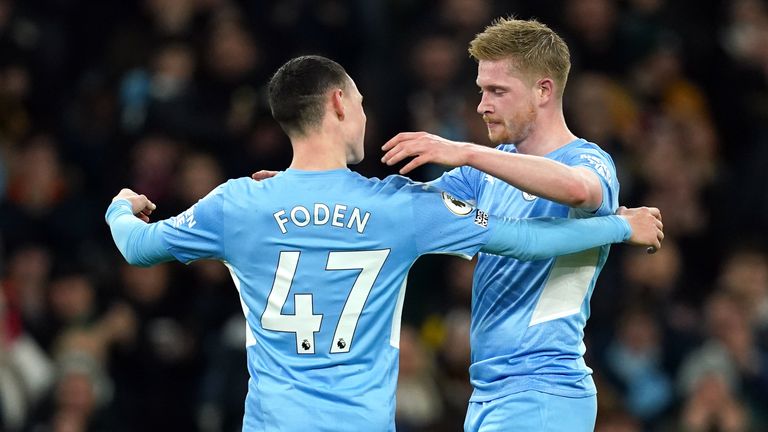 Kevin De Bruyne celebrates his second goal with Phil Foden