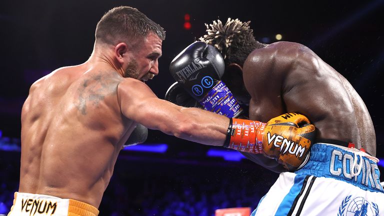 NEW YORK, NEW YORK - DECEMBER 11: Vasiliy Lomachenko (L) and Richard Commey (R) exchange punches during their fight for the WBO Intercontinental Lightweight Championship at Madison Square Garden on December 11, 2021 in New York City.  (Photo by Mikey Williams / Top Rank Inc via Getty Images)