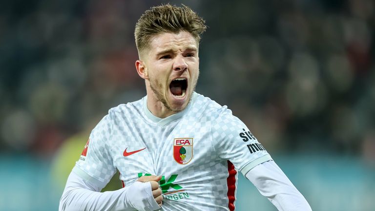 Mads Pedersen celebrates after scoring for Augsburg against Bayern Munich