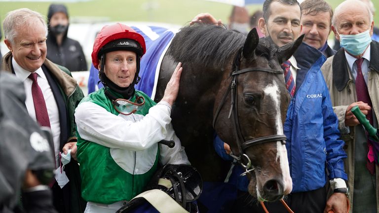 Martin Dwyer and Pyledriver in the winner's enclosure at Epsom after Coronation Cup success