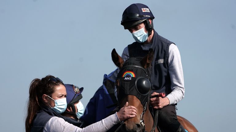 Menzies with horse Rainbow Applause, a one-eyed filly, who raised £20,000 for the NHS