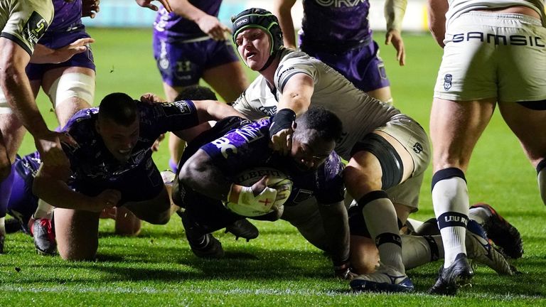 Dragons' Mesake Doge goes over to score a try against Lyon