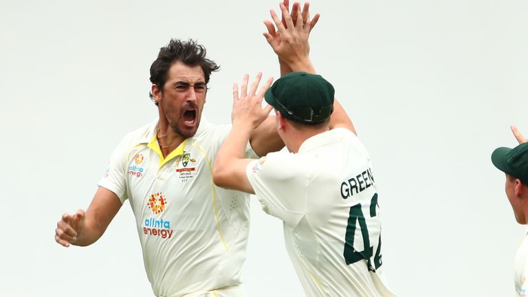 Mitchell Starc celebrates after dismissing Rory Burns first ball of the first Ashes Test