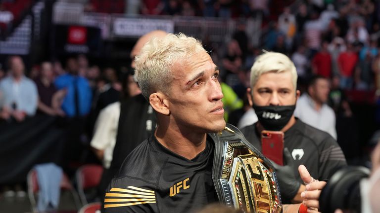 Charles Oliveira after winning the lightweight title at UFC 262 on May 15, 2021, at the Toyota Center in Houston, TX (Louis Grasse/PxImages/Icon Sportswire via AP)