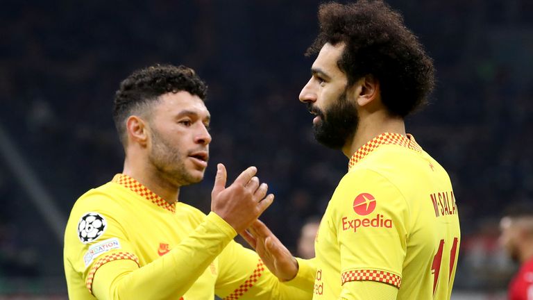 Mo Salah celebrates with Alex Oxlade-Chamberlain after equalising for Liverpool at AC Milan