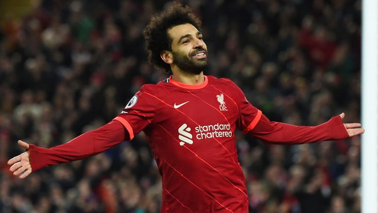 Liverpool's Mohamed Salah cheers after scoring the second goal
