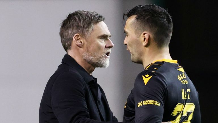  Motherwell manager Graham Alexander (L) and Tony Watt at full time at Easter Road