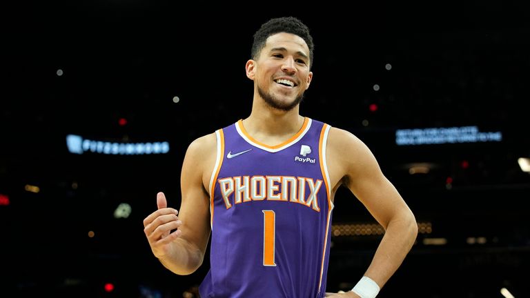 Phoenix Suns guard Devin Booker (1) during the first half of an NBA basketball game against the Charlotte Hornets, Sunday, Dec. 19, 2021, in Phoenix. 