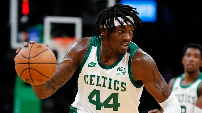 Boston Celtics&#39; Robert Williams III plays against the Toronto Raptors during the first half of an NBA basketball game, Friday, Oct. 22, 2021, in Boston. (AP Photo/Michael Dwyer)


