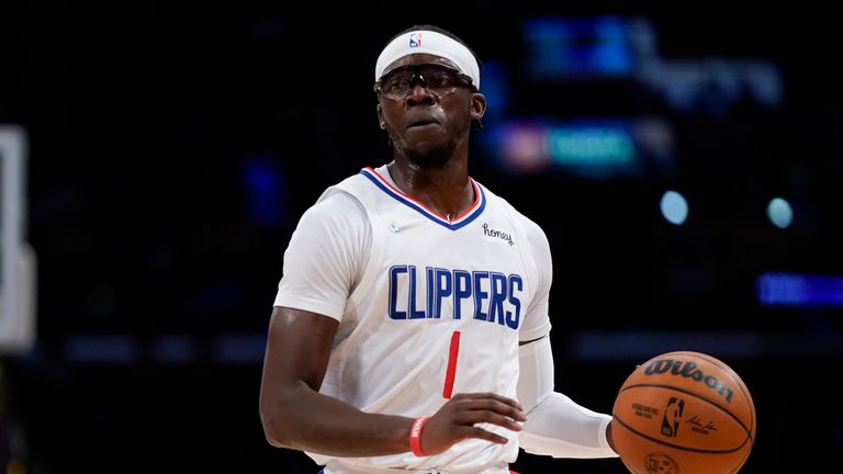 Los Angeles Clippers&#39; Reggie Jackson (1) controls the ball during an NBA basketball game against the Los Angeles Lakers in Los Angeles, Friday, Dec. 3, 2021. (AP Photo/Ashley Landis)


