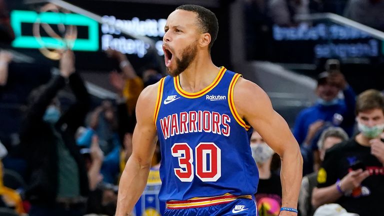 Golden State Warriors guard Stephen Curry (30) celebrates after shooting a 3-point basket against the Memphis Grizzlies during the second half of an NBA basketball game in San Francisco, Thursday, Dec. 23, 2021.