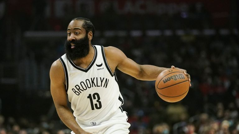 Brooklyn Nets&#39; James Harden dribbles the ball during first half of an NBA basketball game against the Los Angeles Clippers Monday, Dec. 27, 2021, in Los Angeles. (AP Photo/Jae C. Hong)


