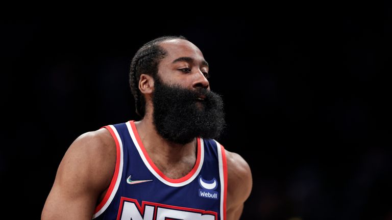 Brooklyn Nets guard James Harden (13) reacts against the Philadelphia 76ers during the first half of an NBA basketball game Thursday, Dec. 30, 2021, in New York. (AP Photo/Adam Hunger)  