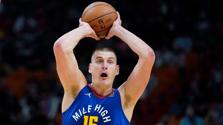 Denver Nuggets center Nikola Jokic passes the ball during the first half of an NBA basketball game against the Miami Heat, Monday, Nov. 29, 2021, in Miami. (AP Photo/Wilfredo Lee)


