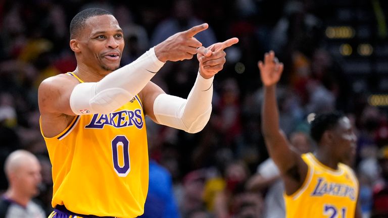 Los Angeles Lakers guard Russell Westbrook (0) reacts after making a 3-point basket during the second half of the team&#39;s NBA basketball game against the Houston Rockets, Tuesday, Dec. 28, 2021, in Houston. (AP Photo/Eric Christian Smith)


