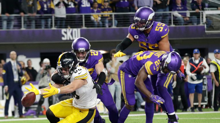 Minnesota Vikings defenders safety Harrison Smith (22), outside linebacker Anthony Barr (55) and free safety Xavier Woods (23) break up a pass intended for Pittsburgh Steelers tight end Pat Freiermuth (88) in the end zone at the end of an NFL football game, Thursday, Dec. 9, 2021, in Minneapolis. The Vikings won 36-28. (AP Photo/Andy Clayton-King)


