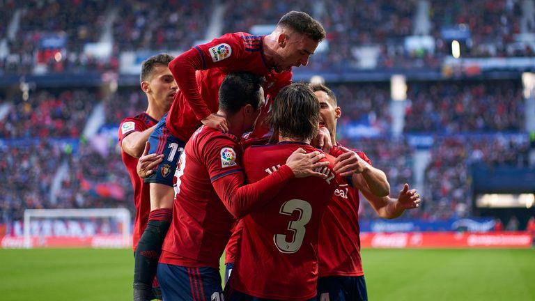 Osasuna celebrate their equaliser against Barcelona