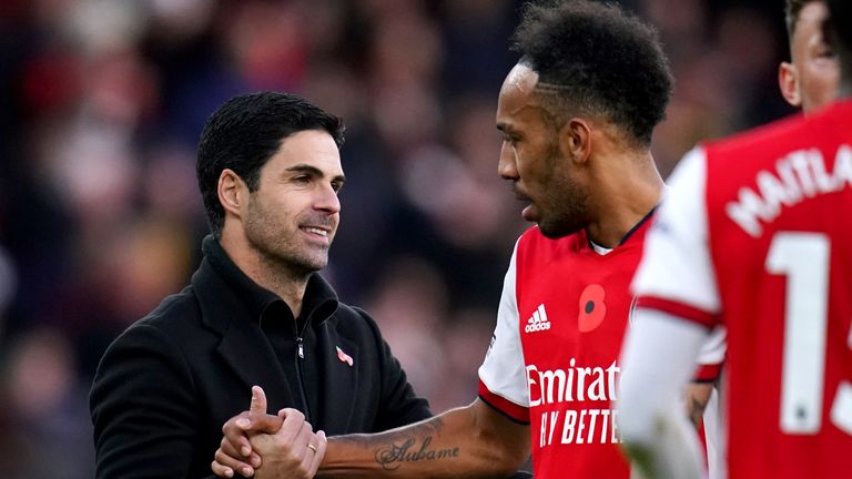 Arsenal manager Mikel Arteta (left) shakes hands with Pierre-Emerick Aubameyang at the end of the Premier League match at the Emirates Stadium, London. Picture date: Sunday November 7, 2021.