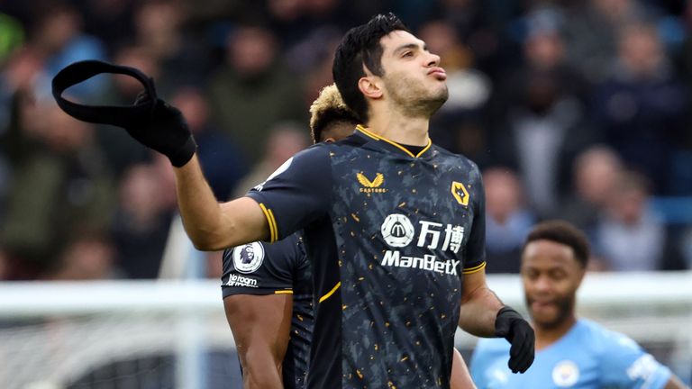 Raul Jimenez reacts after receiving a red card for a second bookable offence 