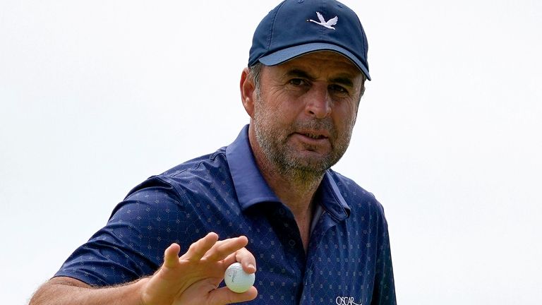 Richard Bland, of England, acknowledges the gallery after his putt on the sixth green during the third round of the U.S. Open Golf Championship, Saturday, June 19, 2021, at Torrey Pines Golf Course in San Diego. (AP Photo/Marcio Jose Sanchez)