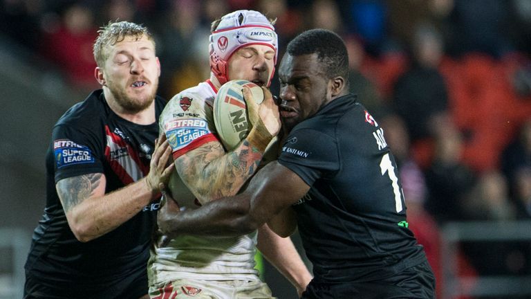 Picture by Isabel Pearce/SWpix.com - 08/03/2019 - Rugby League - Betfred Super League - St Helens v London Broncos - The Totally Wicked Stadium, Langtree Park, St Helens, England - Theo Fages of St Helens is tackled by Jordan Abdull and Sadiq Adebiyi of London Broncos.