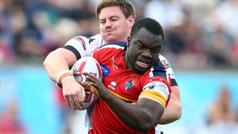 TORONTO, ON - JUNE 09: Sadiq Adebiyi #19 of the London Broncos is tackled Jacob Emmitt #29 of the Toronto Wolfpack in the second half of a Betfred Championship match at Lamport Stadium on June 9, 2018 in Toronto, Canada. (Photo by Vaughn Ridley/SWpix.com)