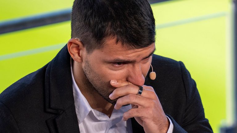 Barcelona striker Sergio Aguero cries during a press conference at the Camp Nou stadium in Barcelona, Spain, Wednesday, Dec. 15, 2021. Sergio Aguero has announced his retirement from football on Wednesday due to a heart condition