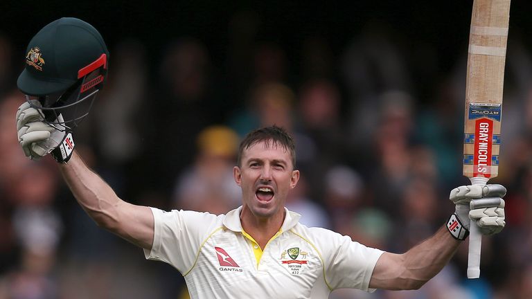Australia's Shaun Marsh celebrates making 100 runs against England during the second day of their Ashes test match in Adelaide, Sunday, Dec. 3, 2017. (AP Photo/Rick Rycroft)..