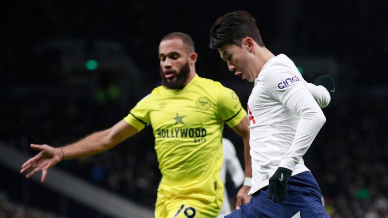 Tottenham's Heung-Min Son challenges for the ball with Brentford's Bryan Mbeumo