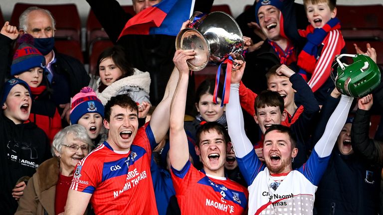 5 December 2021; St Thomas' captain Conor Cooney, left, lifts the cup with David Sherry, centre, and Gerald Kelly after their side's victory in the Galway County Senior Club Hurling Championship Final match between Clarinbridge and St Thomas' at Pearse Stadium in Galway. Photo by Piaras .. M..dheach/Sportsfile