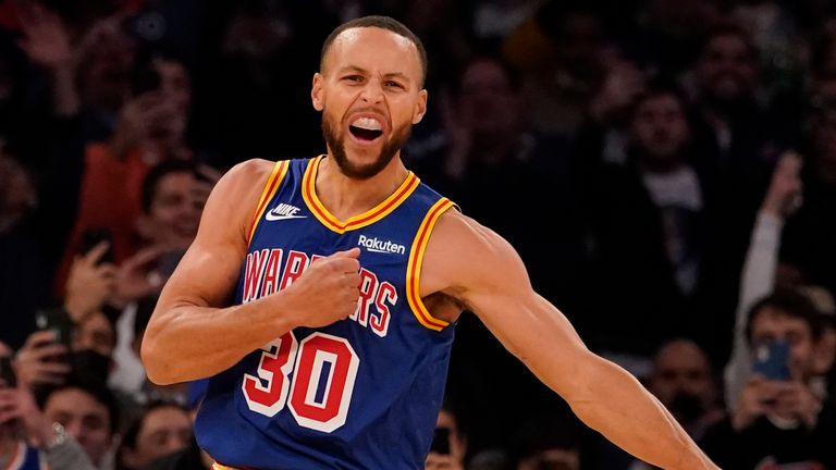Stephen Curry reacts after shooting the history-making three-pointer