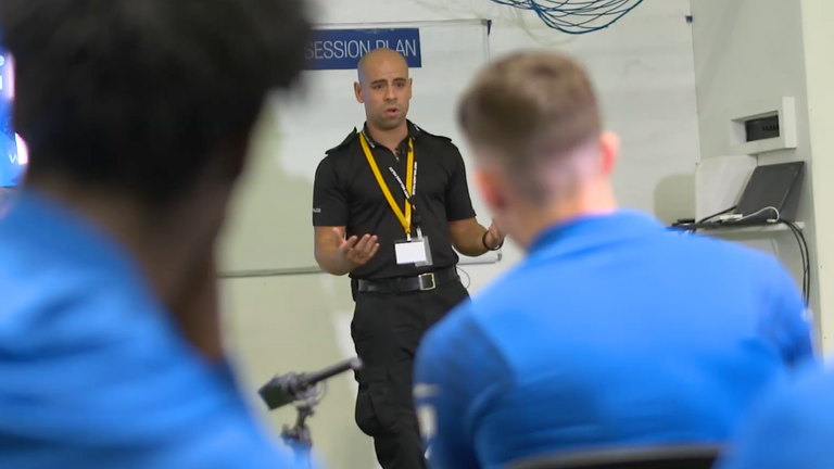 PC Stuart Ward speaks to players at Birmingham City