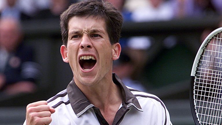 Tim Henman celebrates after defeating American Jim Courier 4-6 7-5 7-5 6-7 9-7 at the Wimbledon Tennis Championships.