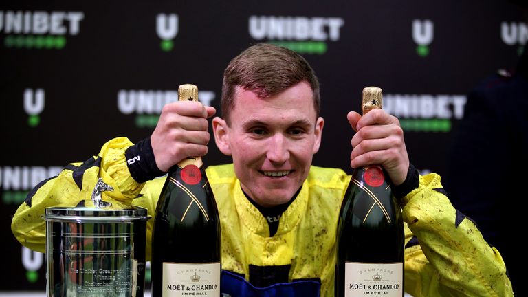 Tom Bellamy celebrates victory on Alan King&#39;s Harambe in the 2019 Greatwood Handicap Hurdle at Cheltenham 