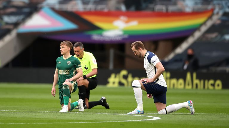 Tottenham Hotspur v Sheffield United - Premier League - Tottenham Hotspur Stadium
Sheffield United's Ben Osborn (left). referee Andre Marriner and Tottenham Hotspur's Harry Kane (right) take a knee during the Premier League match at the Tottenham Hotspur Stadium, London. Issue date: Sunday May 2, 2021.