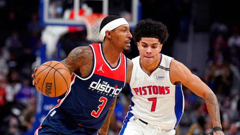 Washington Wizards guard Bradley Beal (3) drives as Detroit Pistons guard Killian Hayes (7) defends during the first half of an NBA basketball game, Wednesday, Dec. 8, 2021, in Detroit. (AP Photo/Carlos Osorio)