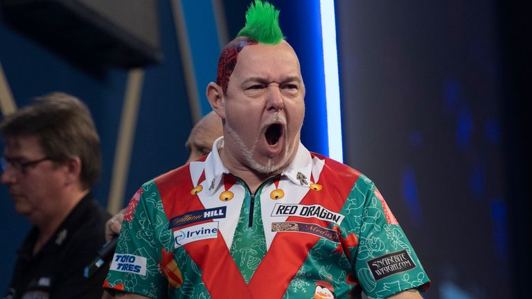 WILLIAM HILL WORLD DARTS CHAMPIONSHIP 2022.ALEXANDRA PALACE,.LONDON.PIC;LAWRENCE LUSTIG.ROUND3.PETER WRIGHT V DAMON HETA.PETER WRIGHT IN ACTION